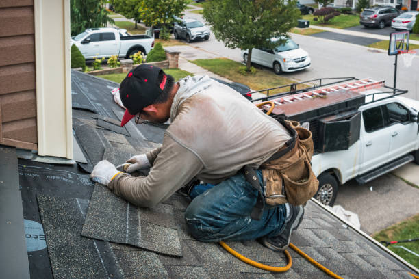 Professional Flat Roof Repair technician working in Somerville, TX